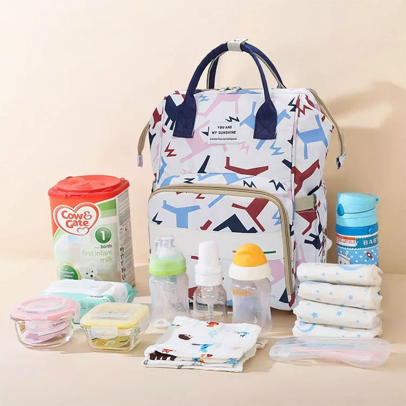 Marketland Online Paraguay - Esta mochila de maternidad es ideal para usar  tanto mamá como papá Moderna, elegante y de excelente calidad. Con  compartimientos para colocar todo lo que necesita tu bebé.